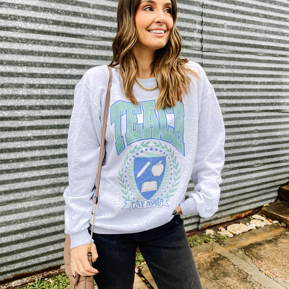 
                      
                        Teacher Crest Sweatshirt
                      
                    