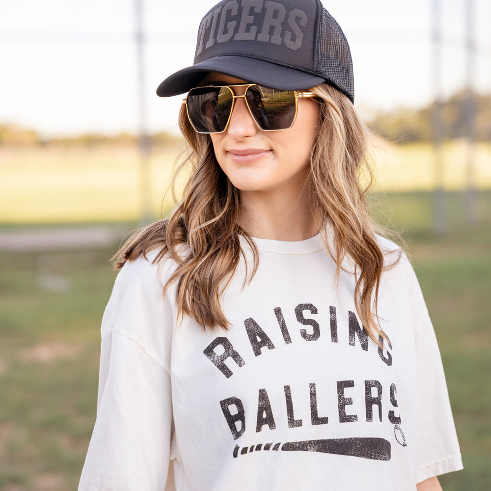 
                      
                        Raising Ballers Tee
                      
                    