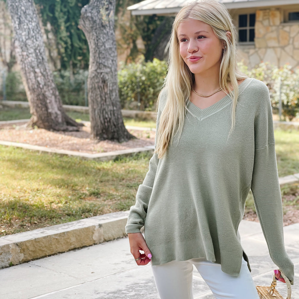 
                      
                        V-Neck Waffle Sweater - Dusty Sage
                      
                    