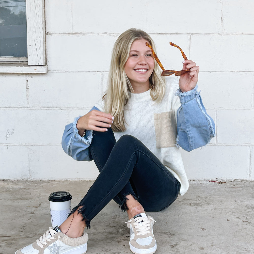 
                      
                        Denim Sleeve Sweater
                      
                    