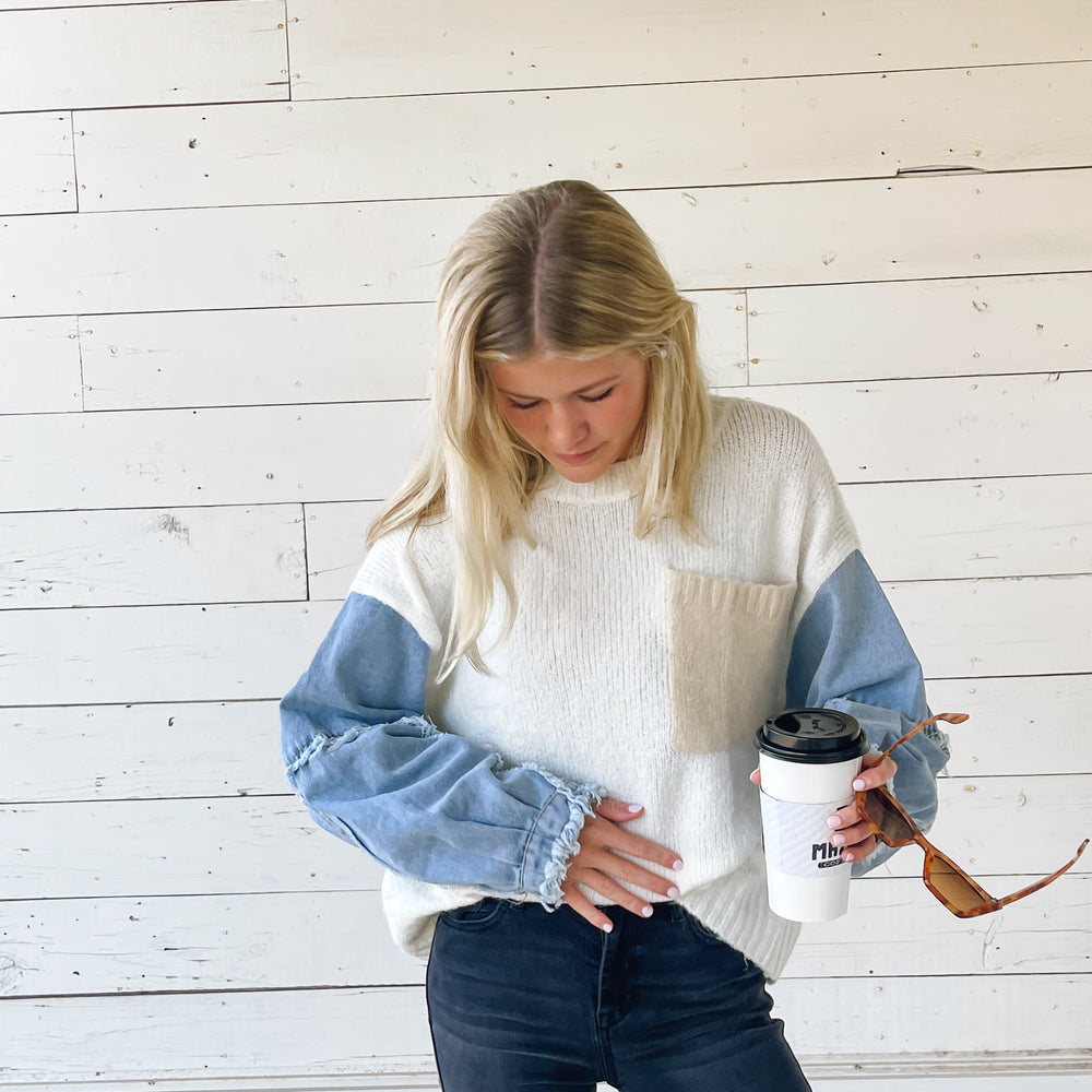 
                      
                        Denim Sleeve Sweater
                      
                    