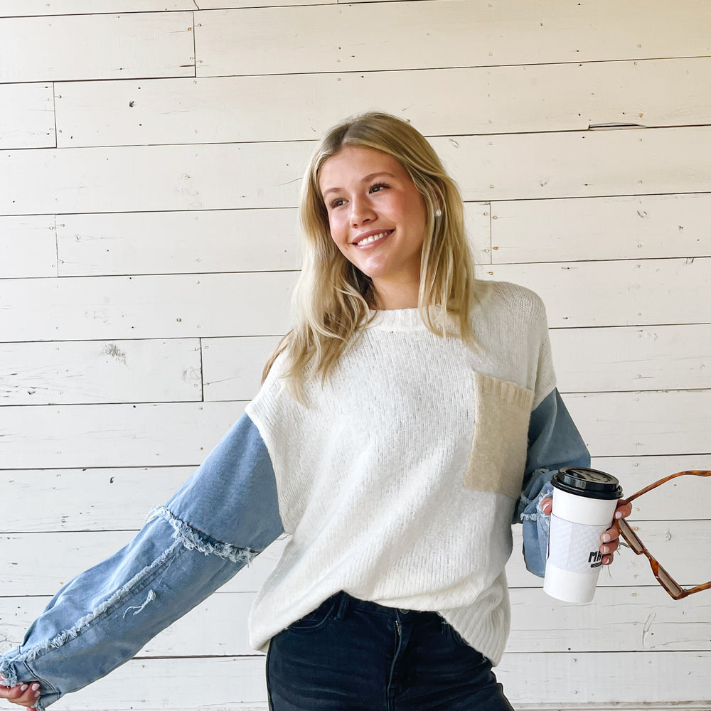 
                      
                        Denim Sleeve Sweater
                      
                    