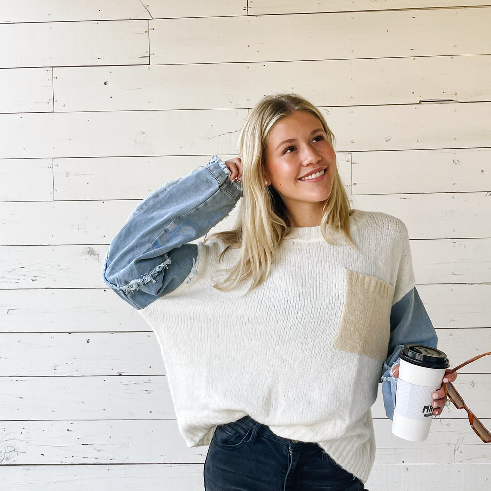 
                      
                        Denim Sleeve Sweater
                      
                    