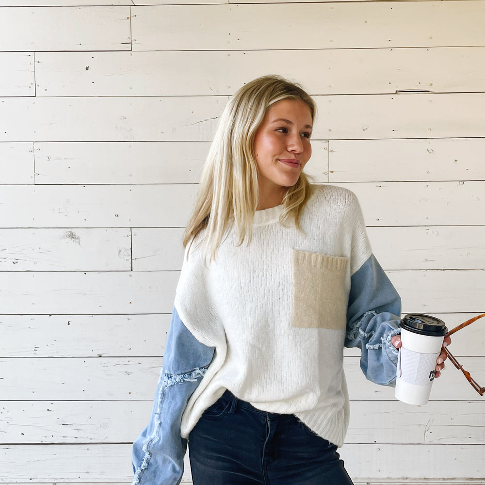 
                      
                        Denim Sleeve Sweater
                      
                    