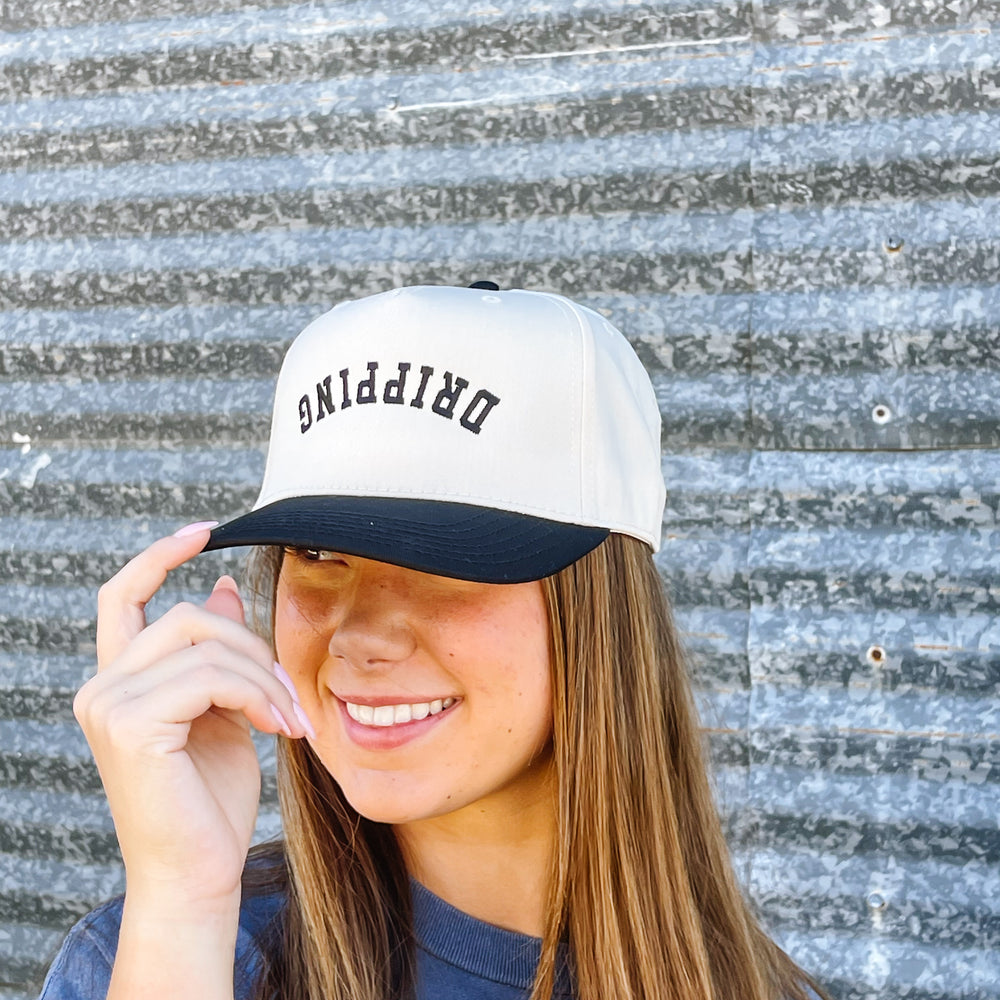 
                      
                        Dripping Trucker Hat
                      
                    