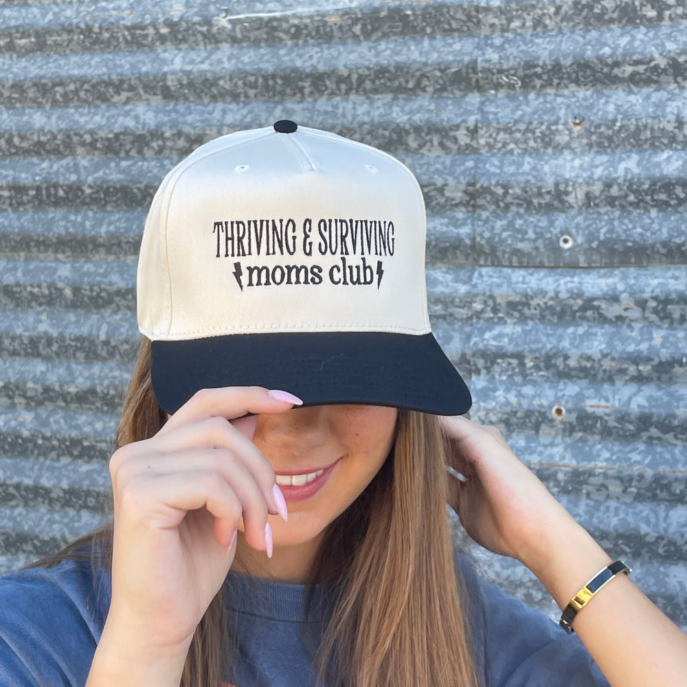 
                      
                        Thriving & Surviving Moms Club Trucker Hat
                      
                    